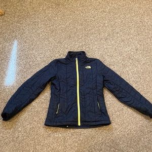 Black Northface jacket with yellow accents. Size small. Like new